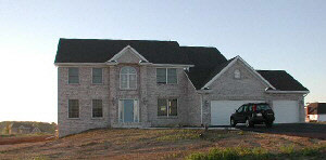 12273 Bellingham Road Caledonia, IL 61011 - Photo 1 of 1 a front view of a house with yard