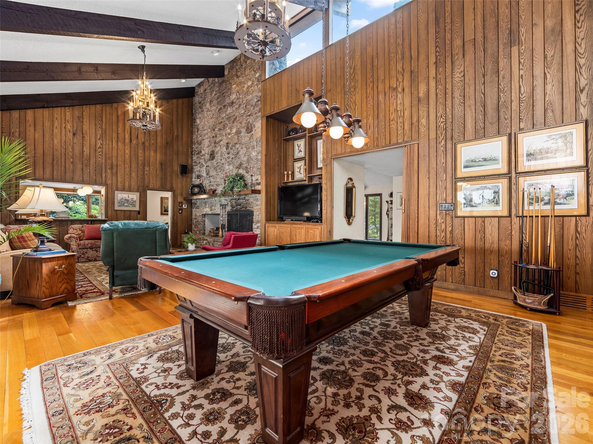 69 Forest Road Asheville, NC 28803 - Photo 9 of 48 a room with pool table and windows