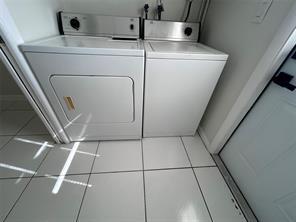 3614 Taylor Street Hollywood, FL 33021 - Photo 9 of 20 a utility room with dryer and washer