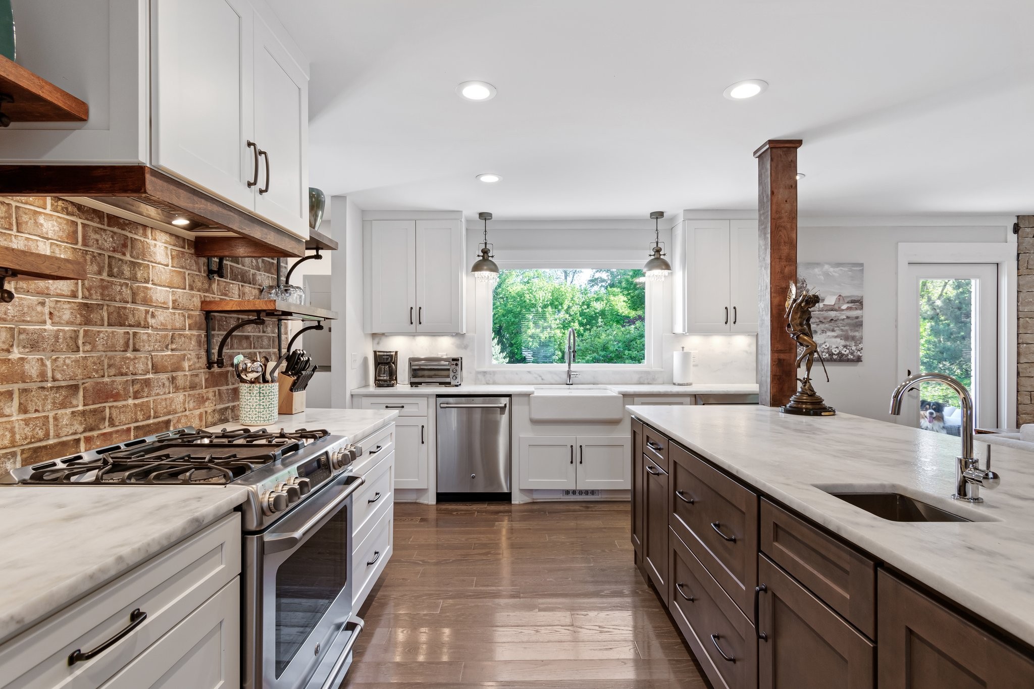 183 Lancaster Drive Franklin, TN 37064 - Photo 11 of 39 a kitchen with a sink stove and cabinets