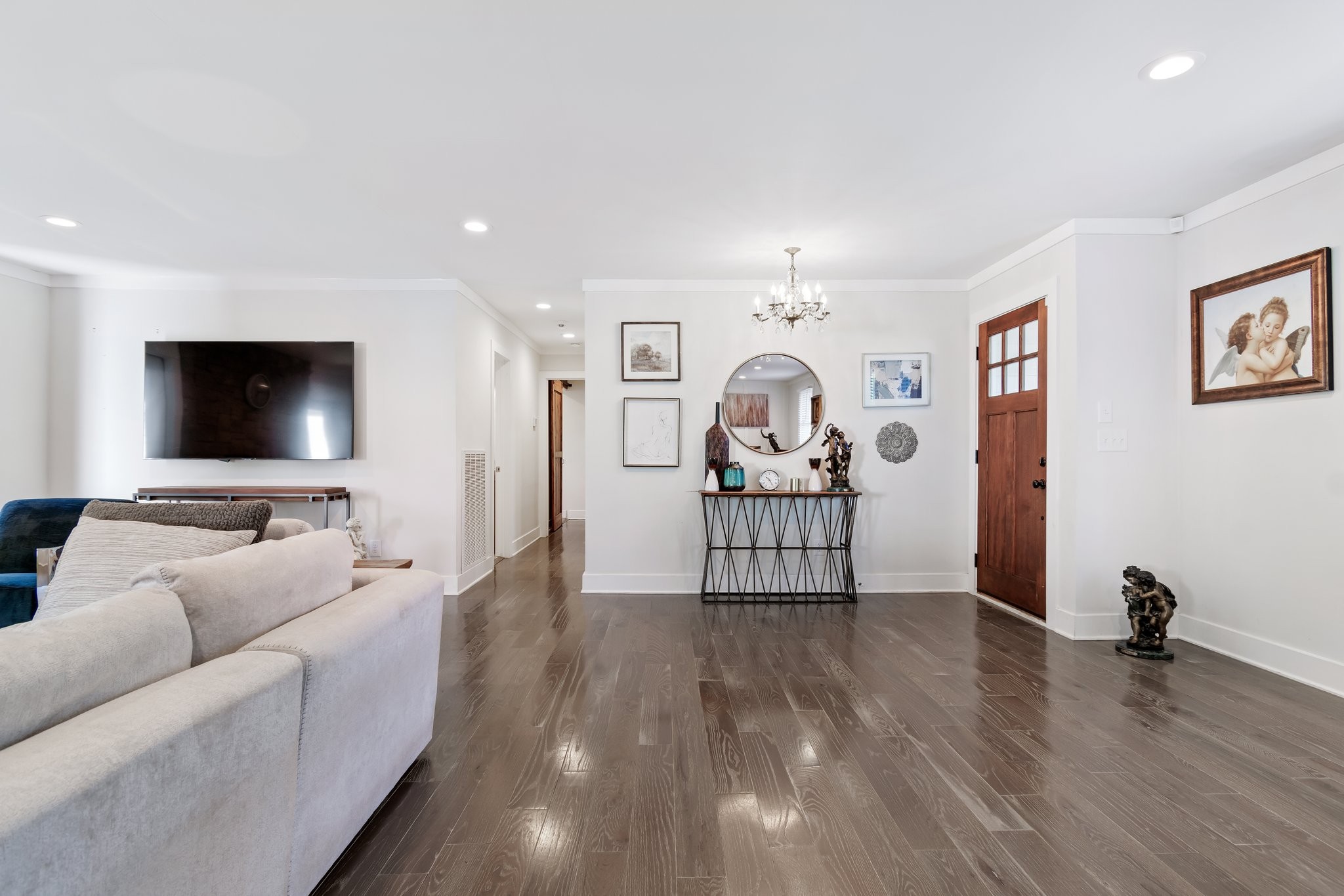 183 Lancaster Drive Franklin, TN 37064 - Photo 17 of 39 a living room with furniture and a flat screen tv
