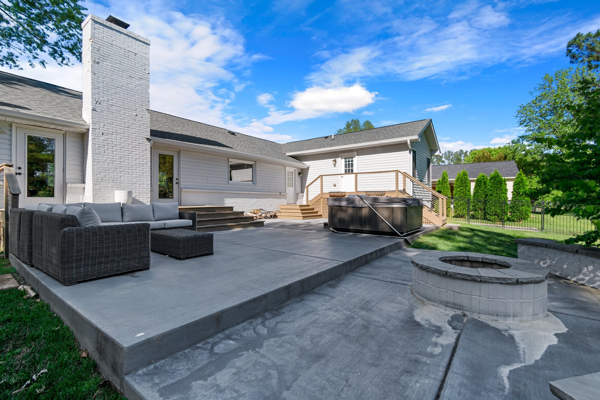 183 Lancaster Drive Franklin, TN 37064 - Photo 34 of 39 a view of a patio with couches chairs and a fire pit