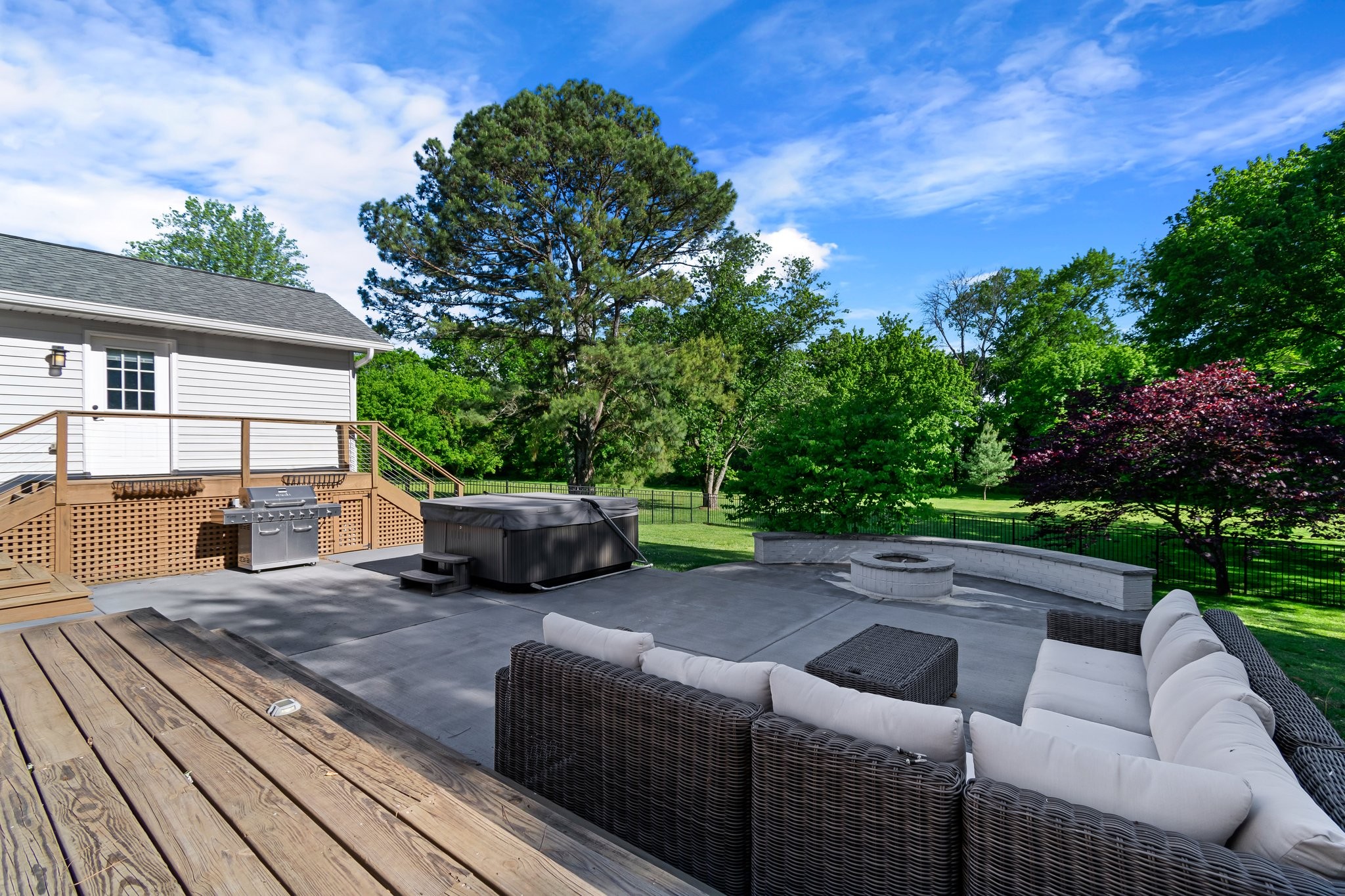 183 Lancaster Drive Franklin, TN 37064 - Photo 35 of 39 a view of a patio with couches table and chairs with wooden floor and fence