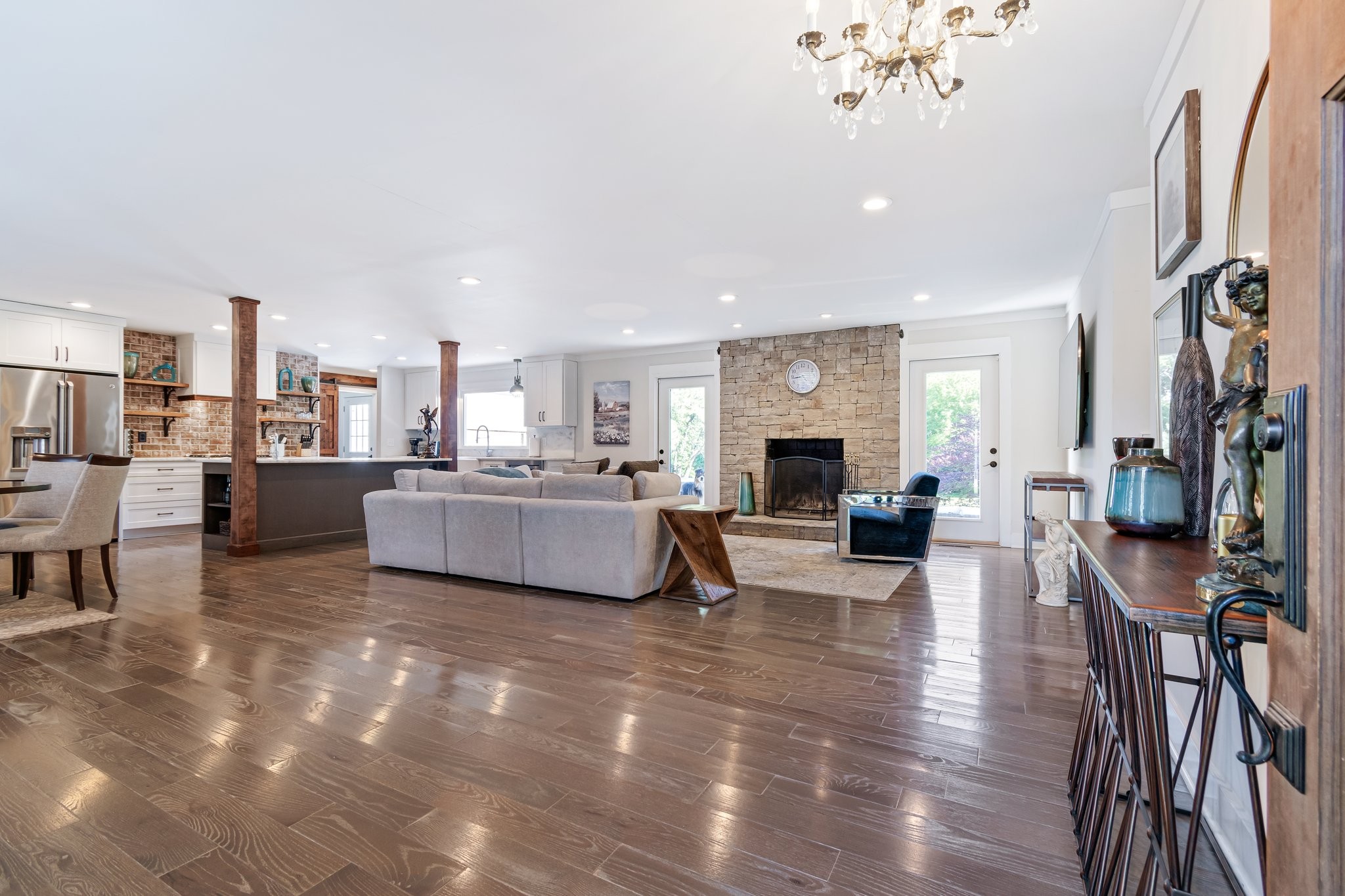 183 Lancaster Drive Franklin, TN 37064 - Photo 5 of 39 a living room with furniture and a fireplace