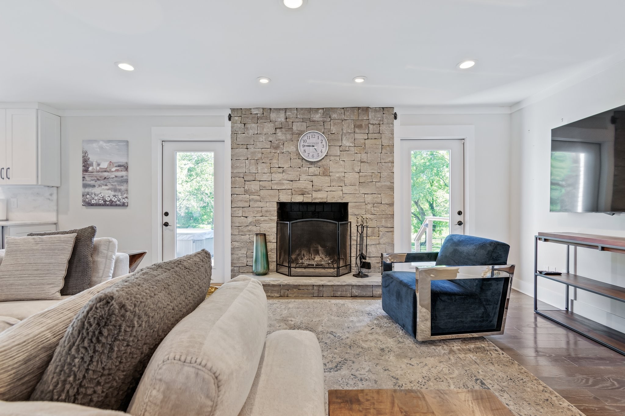 183 Lancaster Drive Franklin, TN 37064 - Photo 6 of 39 a living room with furniture and a fireplace