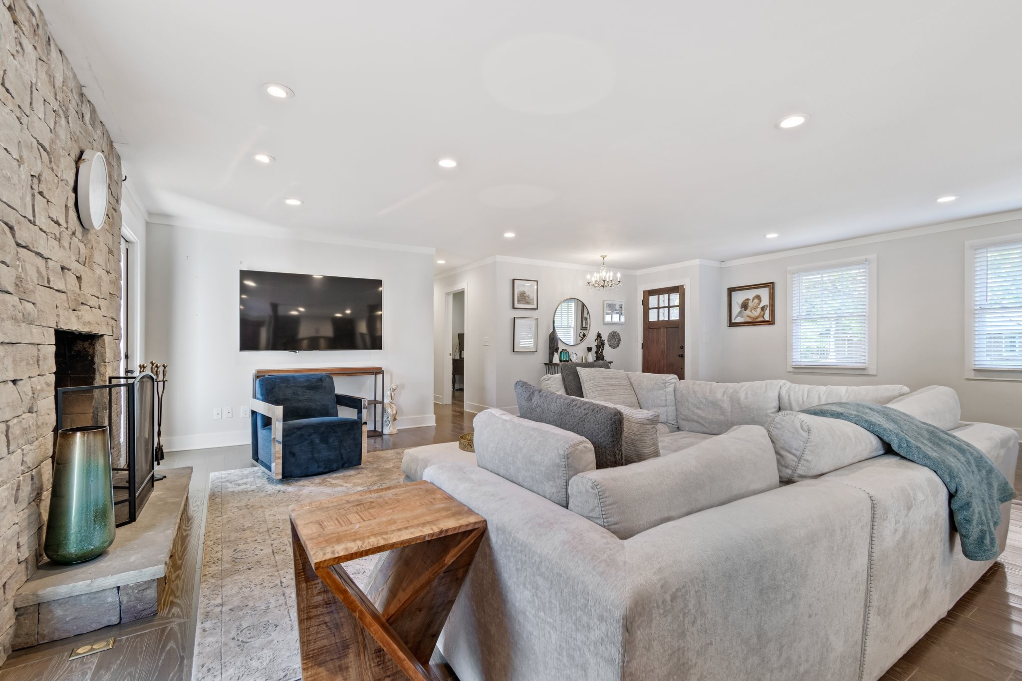 183 Lancaster Drive Franklin, TN 37064 - Photo 9 of 39 a living room with furniture and a flat screen tv