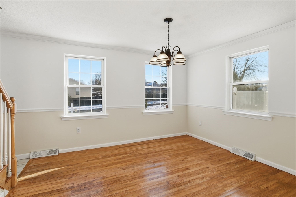 22 Pheasant Drive Springfield, MA 01119 - Photo 15 of 40 a view of empty room with windows