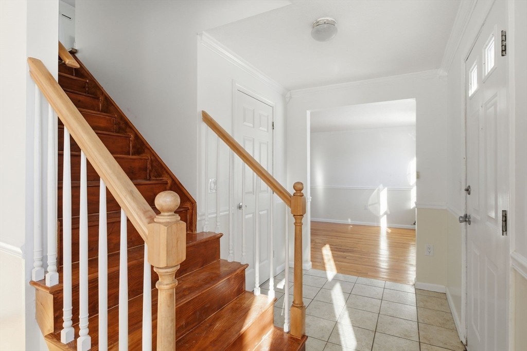 22 Pheasant Drive Springfield, MA 01119 - Photo 23 of 40 a view of entryway and hall with wooden floor