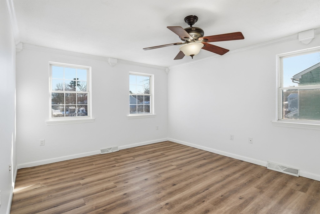 22 Pheasant Drive Springfield, MA 01119 - Photo 28 of 40 a view of empty room with wooden floor