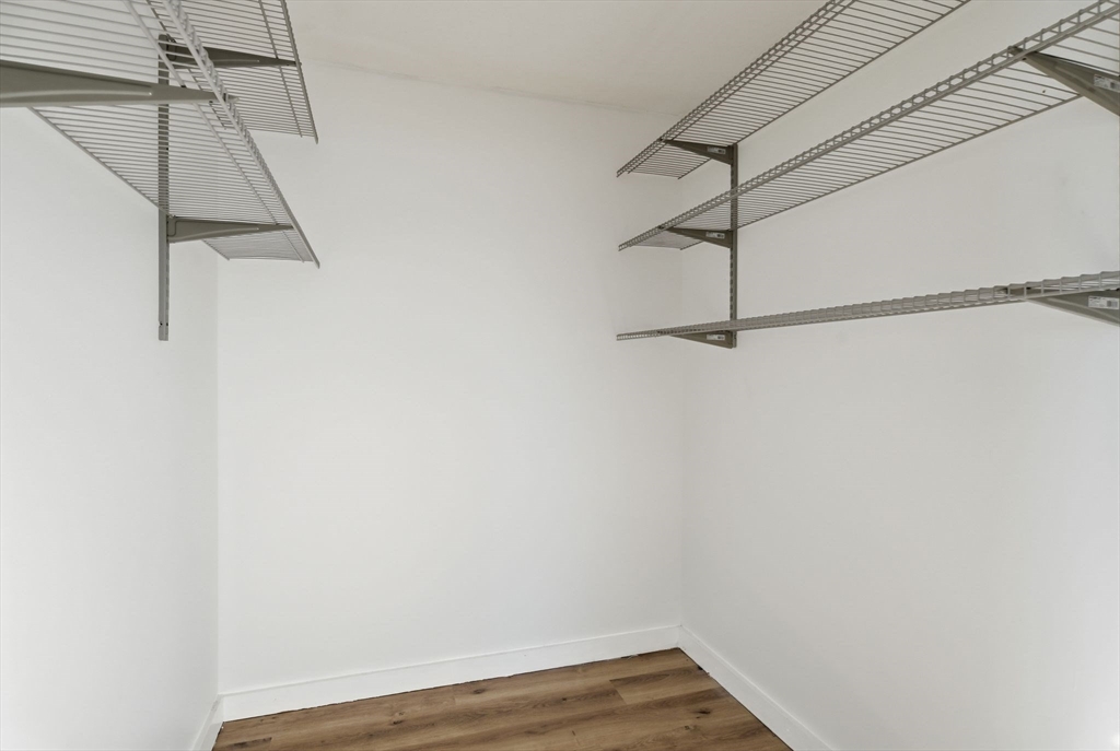 22 Pheasant Drive Springfield, MA 01119 - Photo 30 of 40 a view of a room with wooden floor