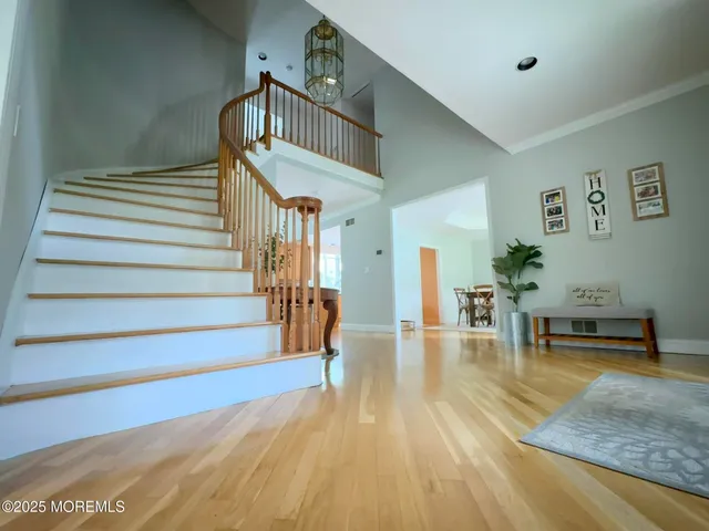 a kitchen with stainless steel appliances granite countertop a sink and cabinets