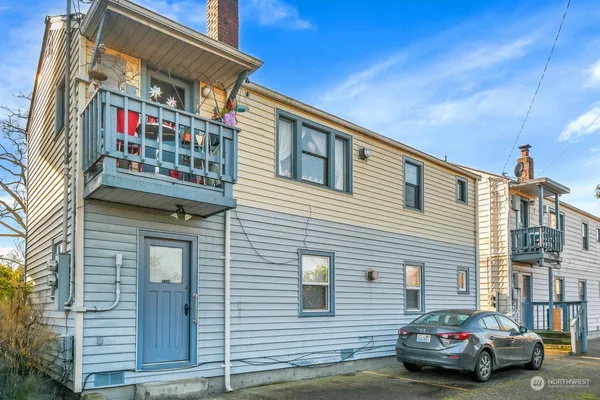 a front view of a house with balcony