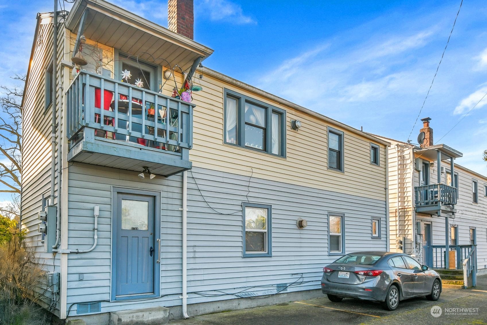 2515 Belvidere Avenue Southwest Seattle, WA 98126 - Photo 11 of 39 a front view of a house with balcony