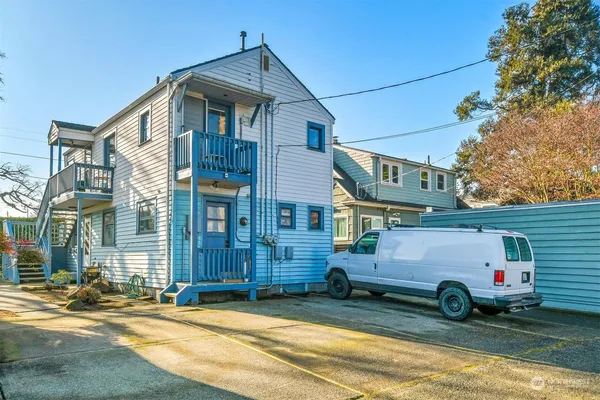 a car parked in front of a house