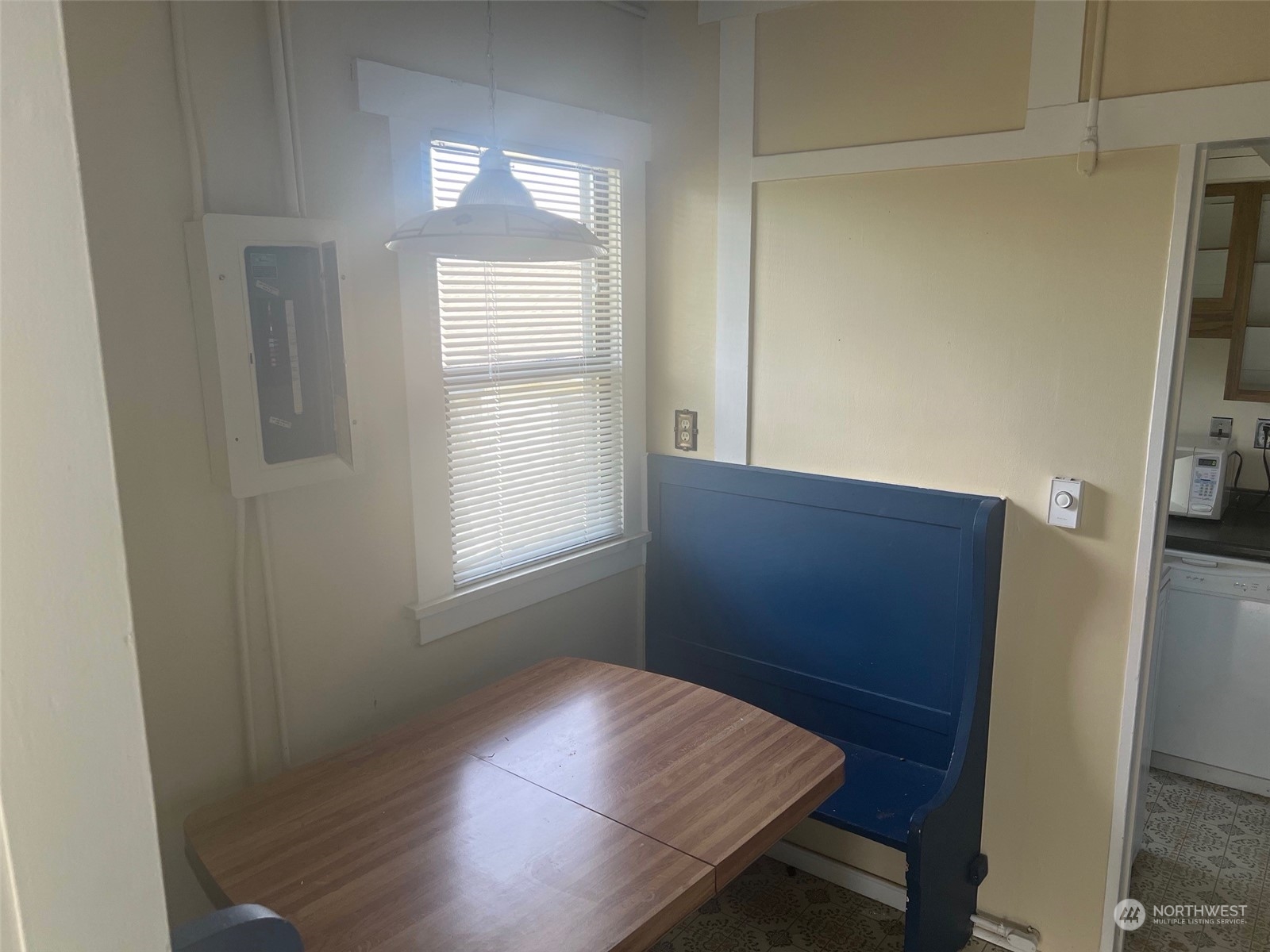 2515 Belvidere Avenue Southwest Seattle, WA 98126 - Photo 32 of 39 a view of empty room with window and wooden floor