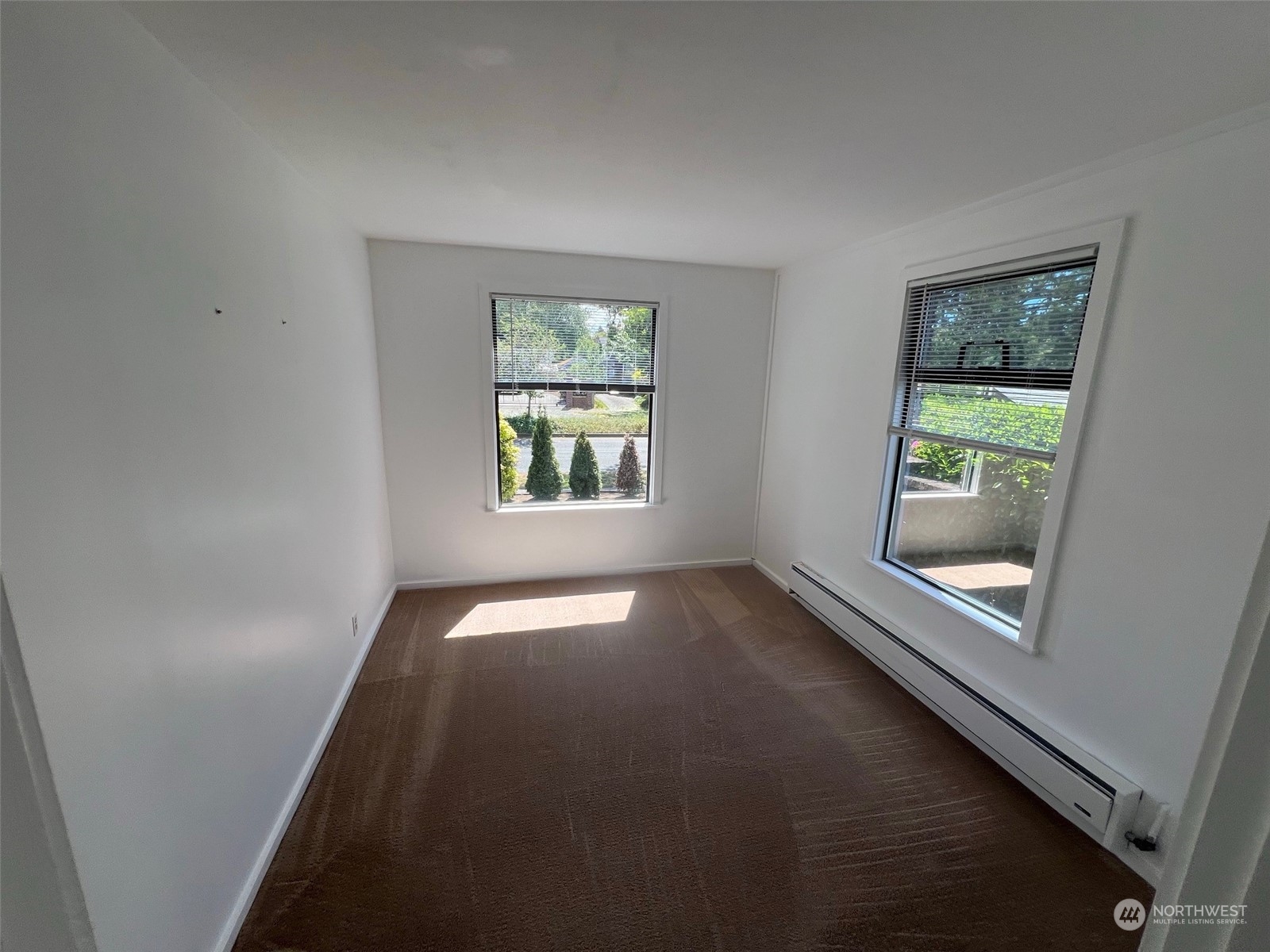 2515 Belvidere Avenue Southwest Seattle, WA 98126 - Photo 35 of 39 an empty room with windows