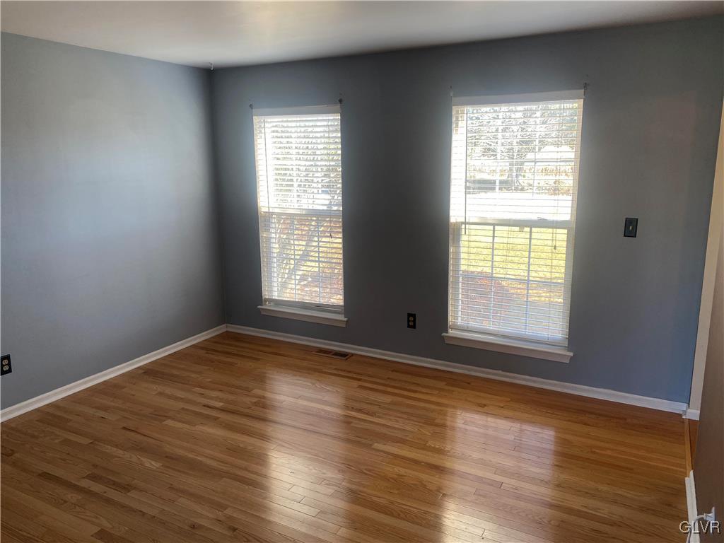 2910 Sickle Road Bath, PA 18014 - Photo 15 of 30 an empty room with wooden floor and windows