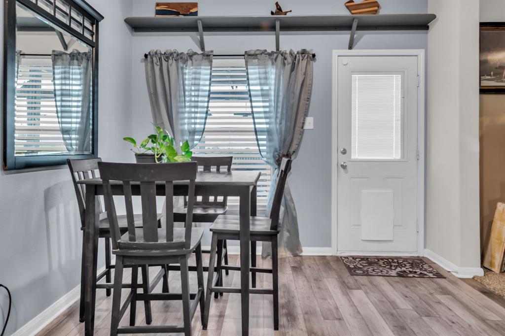189 Point Rider Road Newark, TX 76071 - Photo 13 of 40 a view of a dining room with furniture and window