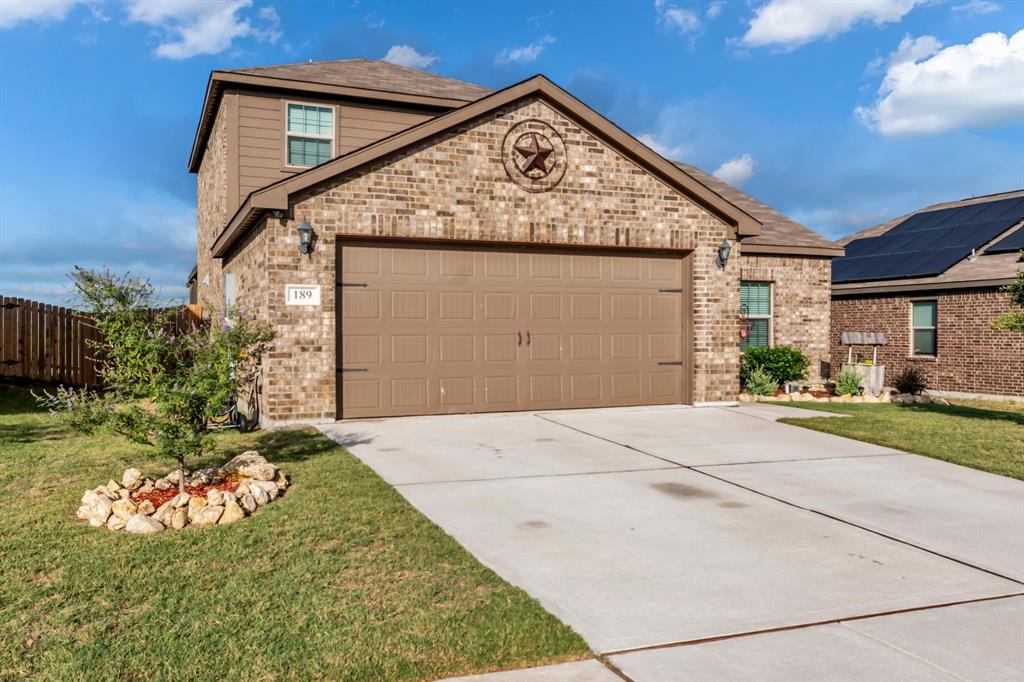 189 Point Rider Road Newark, TX 76071 - Photo 2 of 40 a view of a house with a yard