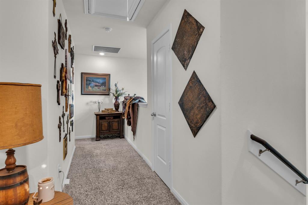 189 Point Rider Road Newark, TX 76071 - Photo 23 of 40 a living room with furniture and a flat screen tv