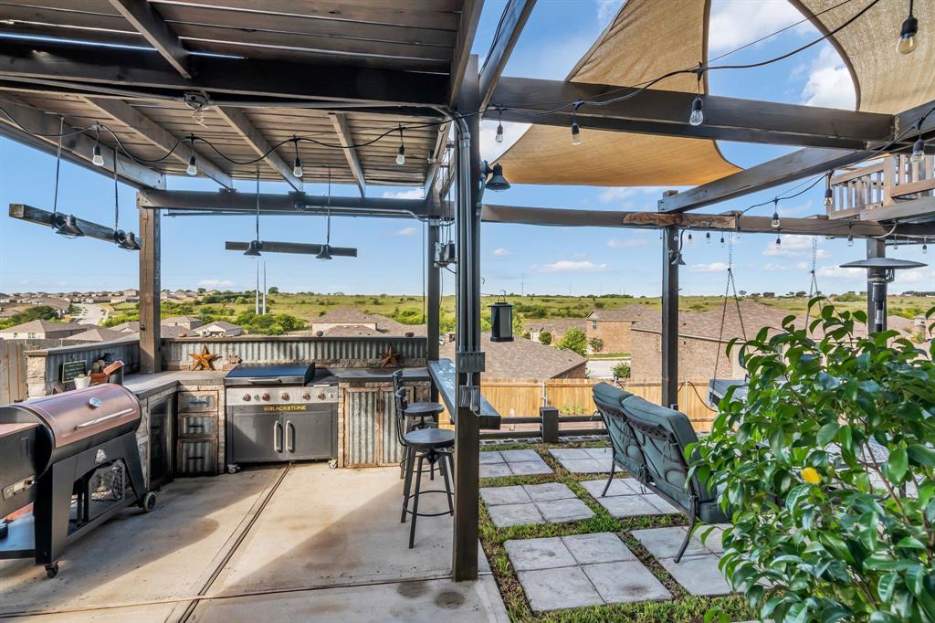 189 Point Rider Road Newark, TX 76071 - Photo 28 of 40 a view of a swimming pool with outdoor seating
