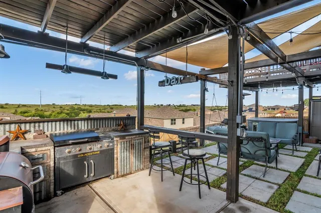 a view of a chairs and table in the room