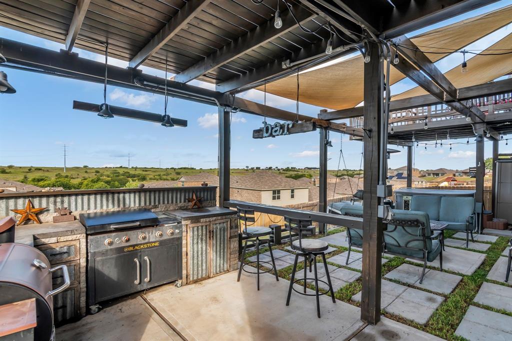 189 Point Rider Road Newark, TX 76071 - Photo 29 of 40 a view of a chairs and table in the room