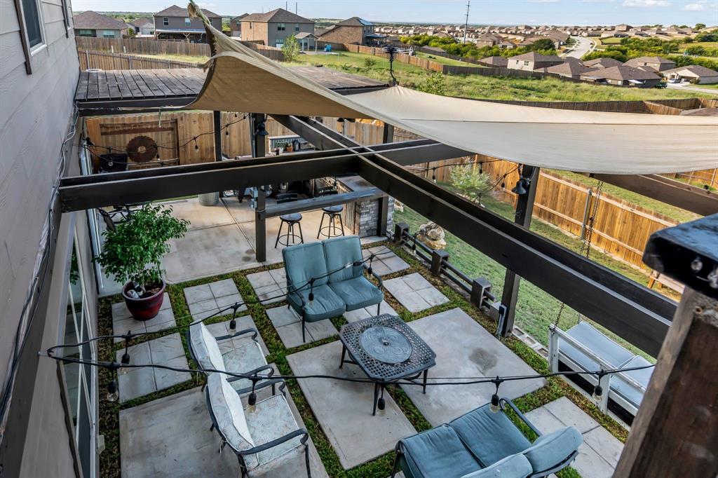 189 Point Rider Road Newark, TX 76071 - Photo 36 of 40 a view of balcony with furniture