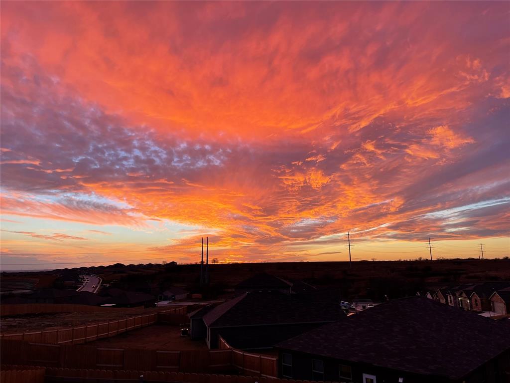 189 Point Rider Road Newark, TX 76071 - Photo 37 of 40 a view of sunset
