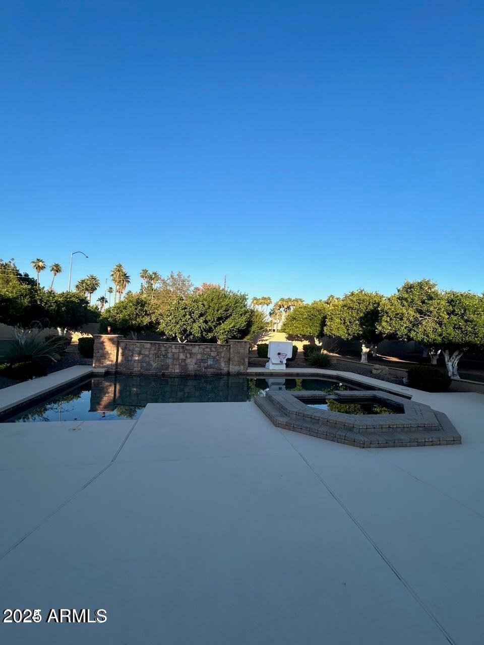 3552 East Jaeger Circle Mesa, AZ 85213 - Photo 20 of 21 a view of a lake with a car parked