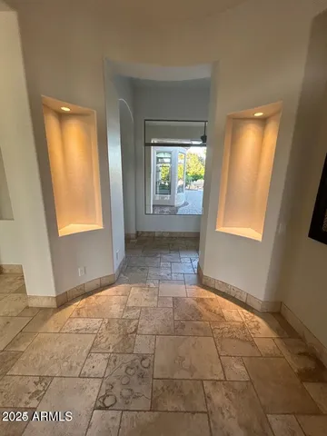 a view of an empty room and window