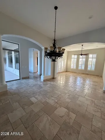 a view of a room with a chandelier