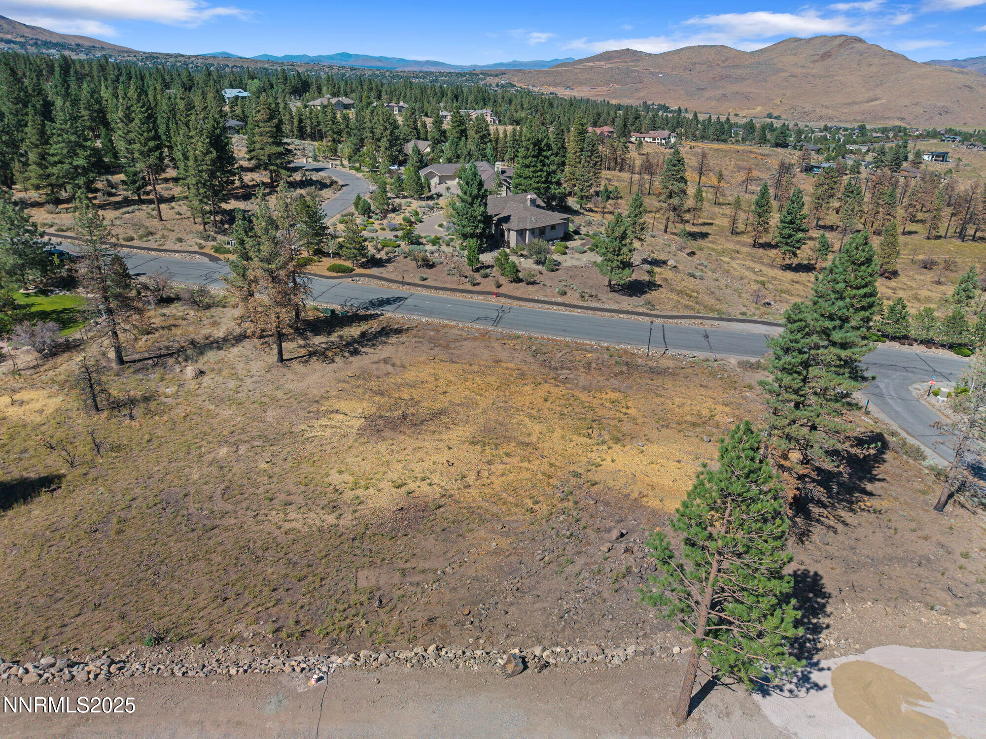 605 Sand Cherry Court Reno, NV 89511 - Photo 17 of 27 a view of a lake with a mountain