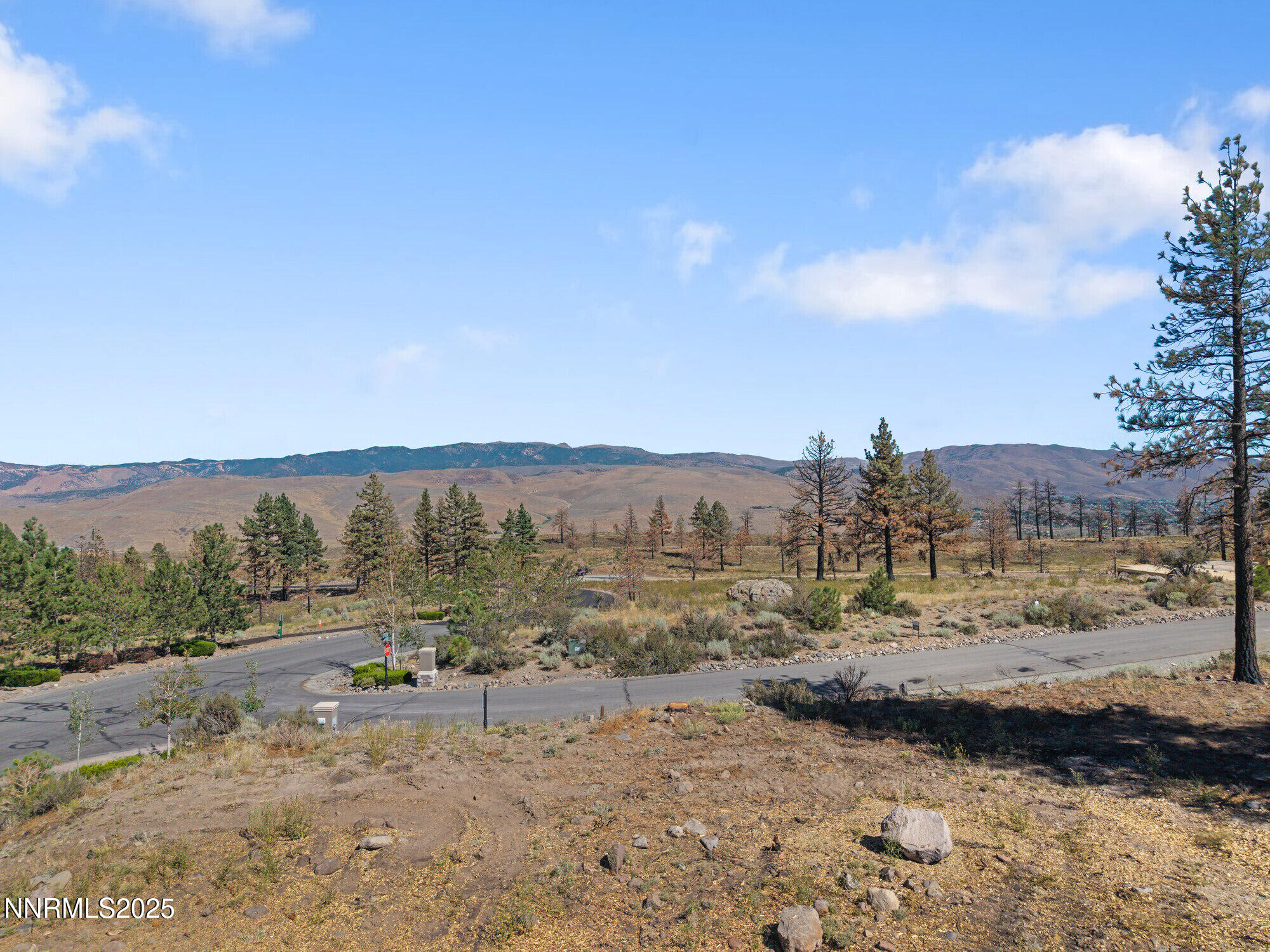 605 Sand Cherry Court Reno, NV 89511 - Photo 22 of 27 a view of lake with mountain in the background