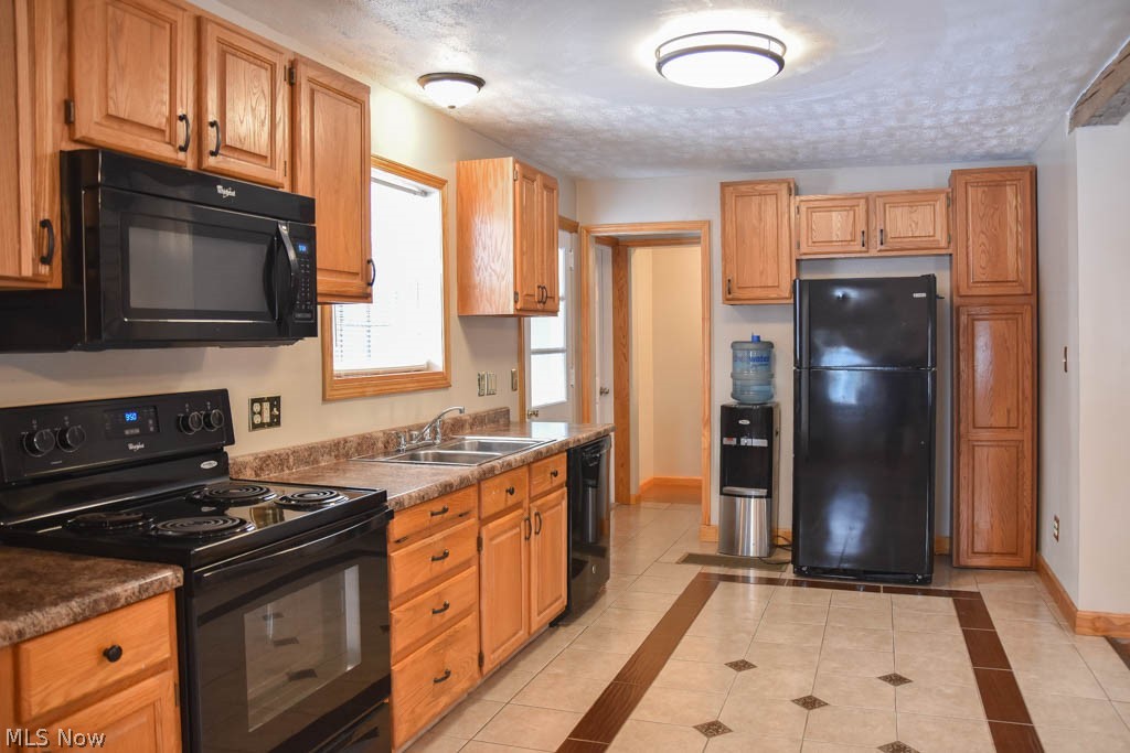 973 Mishler Road Mogadore, OH 44260 - Photo 3 of 20 Fully applianced kitchen with a pantry.