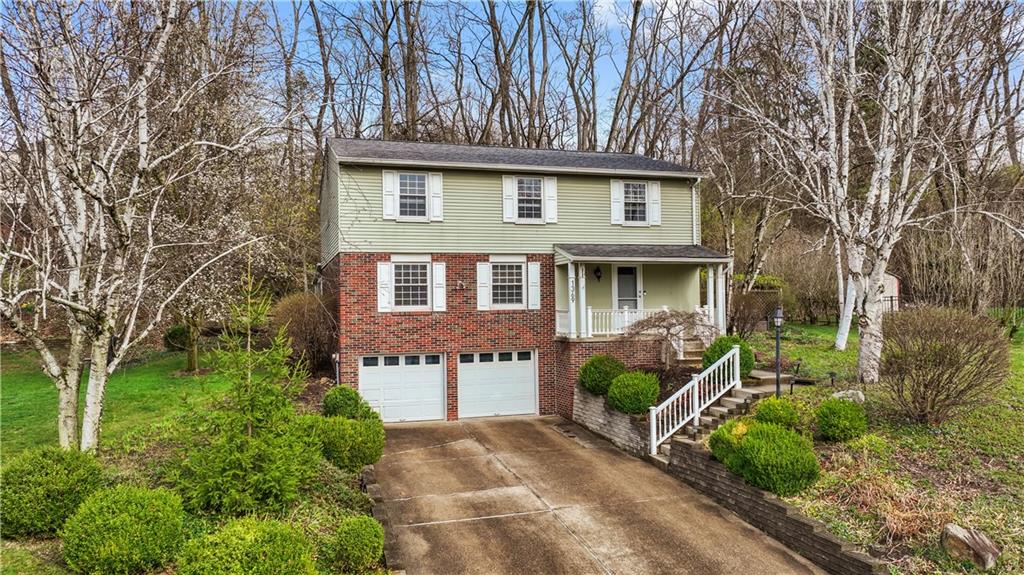 front view of a house with a yard