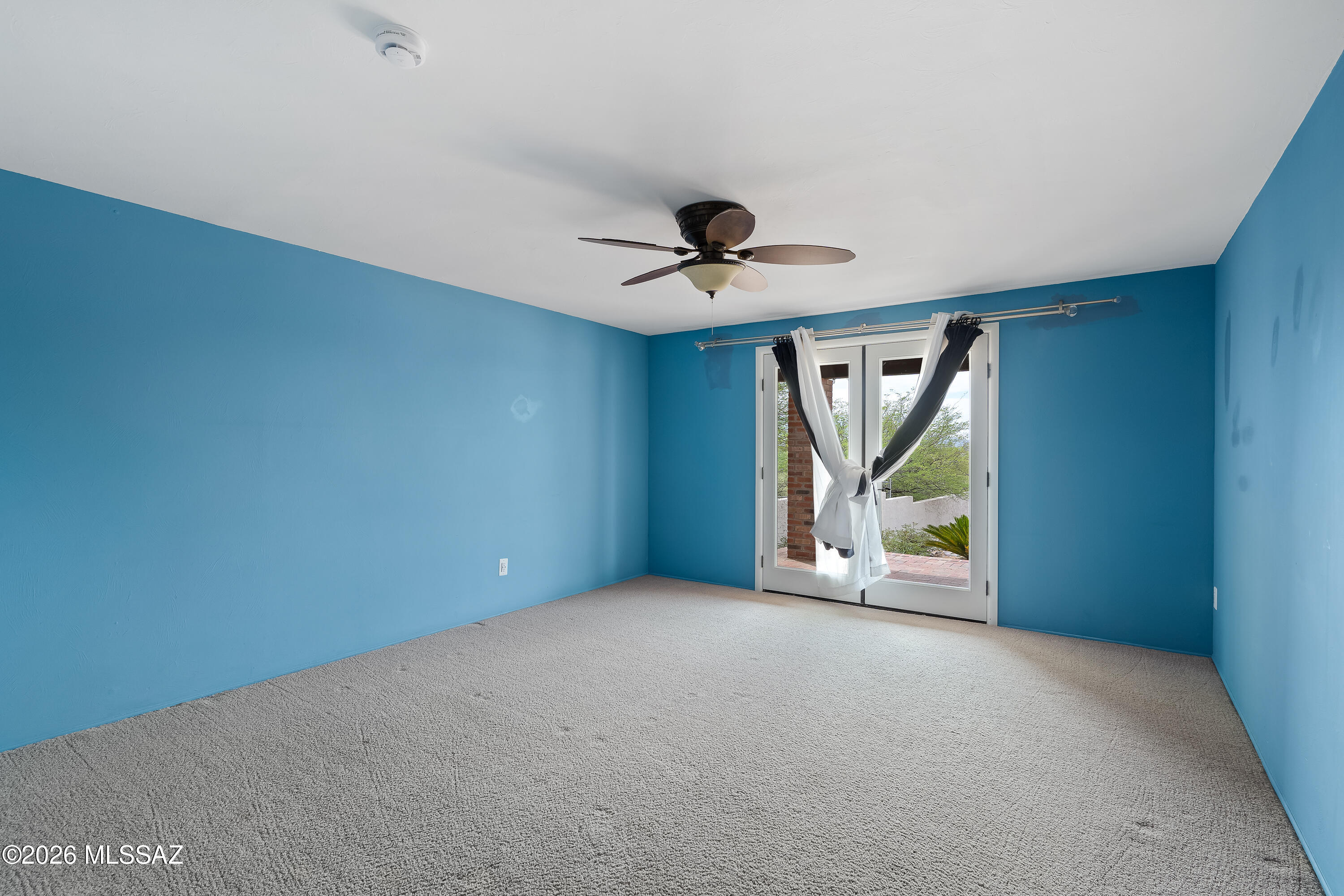 9420 East Ravine Trail Tucson, AZ 85749 - Photo 15 of 39 a view of an empty room with a window