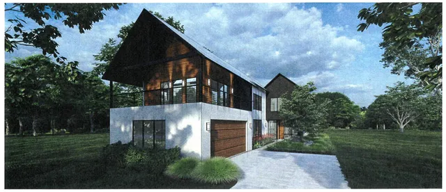 a front view of house with yard and green space