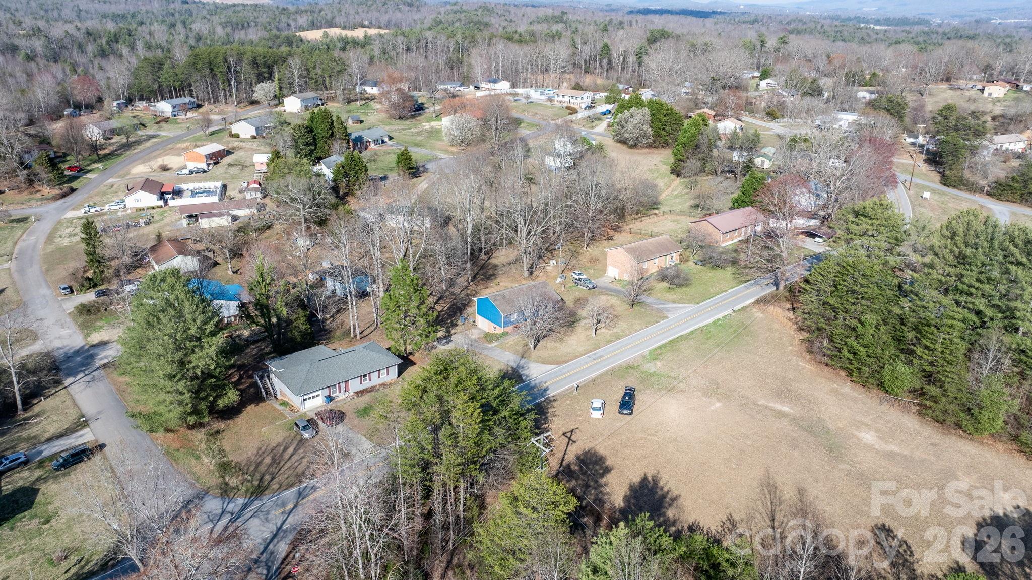3384 Sheely Road Lenoir, NC 28645 - Photo 13 of 27 an aerial view of a city with lots of residential buildings