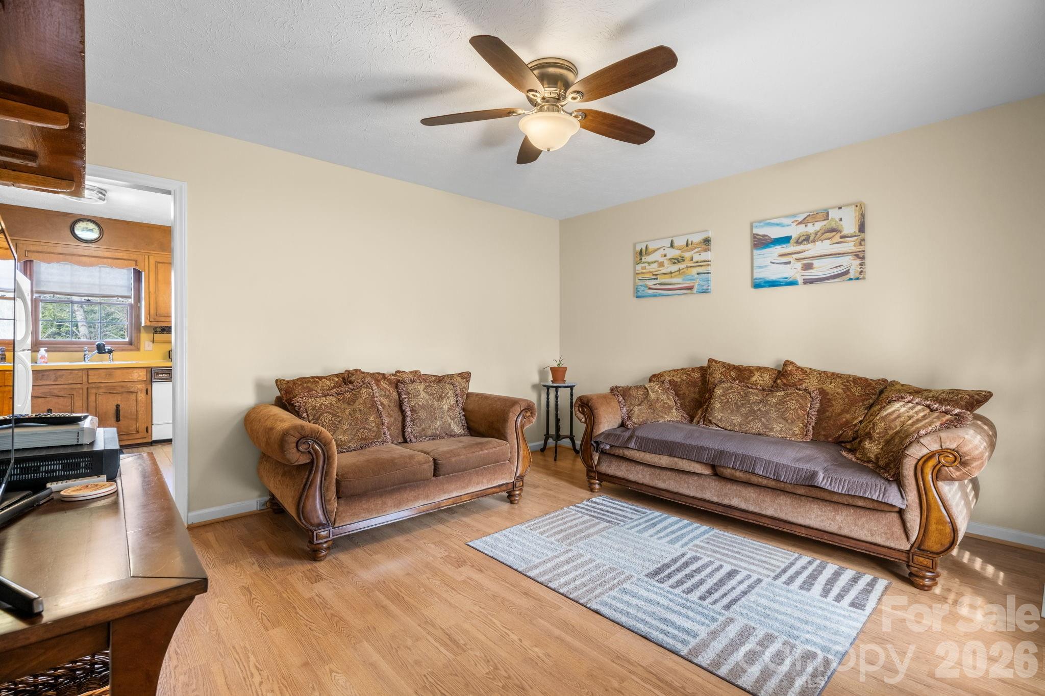 3384 Sheely Road Lenoir, NC 28645 - Photo 14 of 27 a living room with furniture and a couch