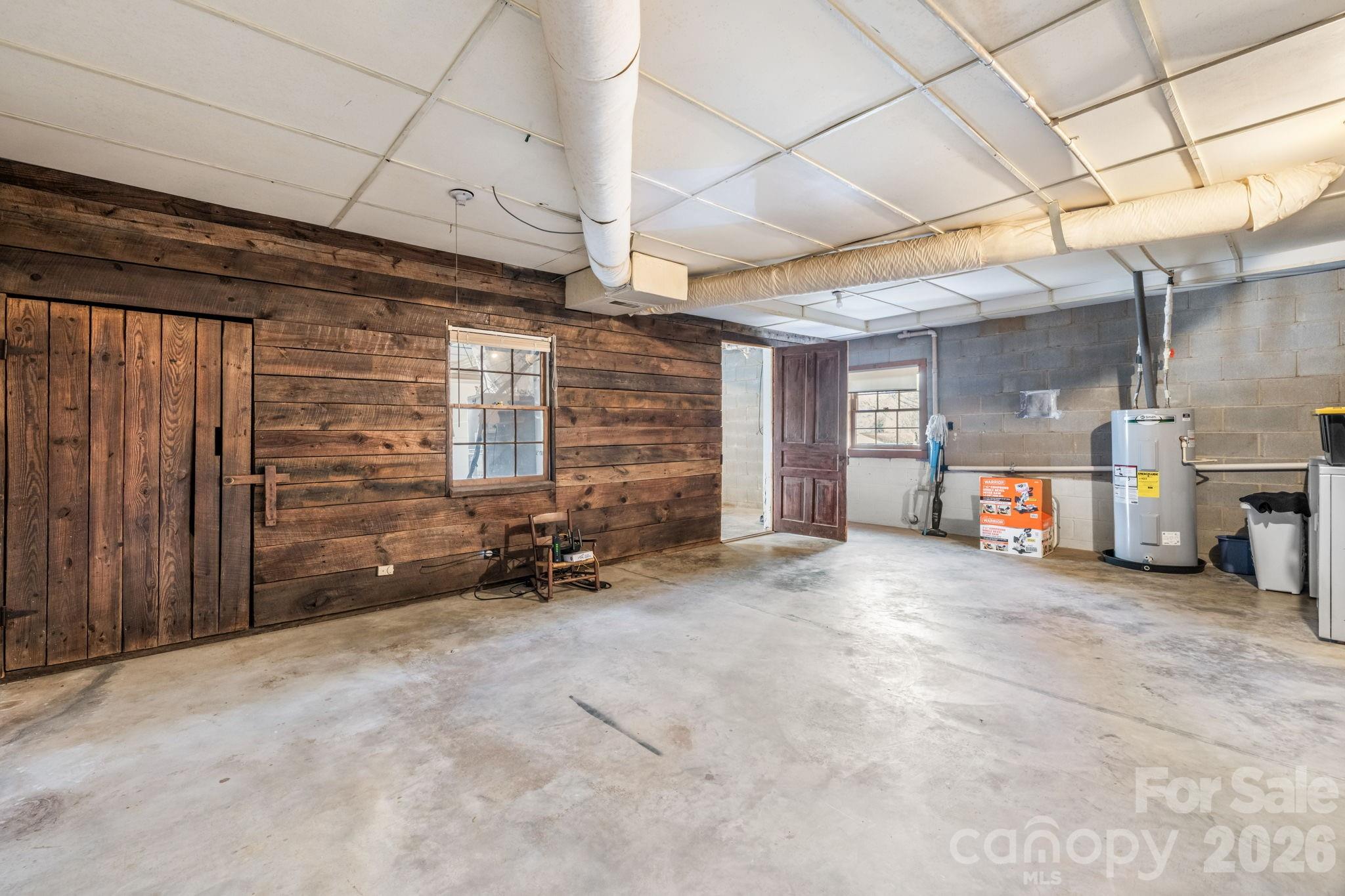 3384 Sheely Road Lenoir, NC 28645 - Photo 24 of 27 a view of an empty room with a fireplace