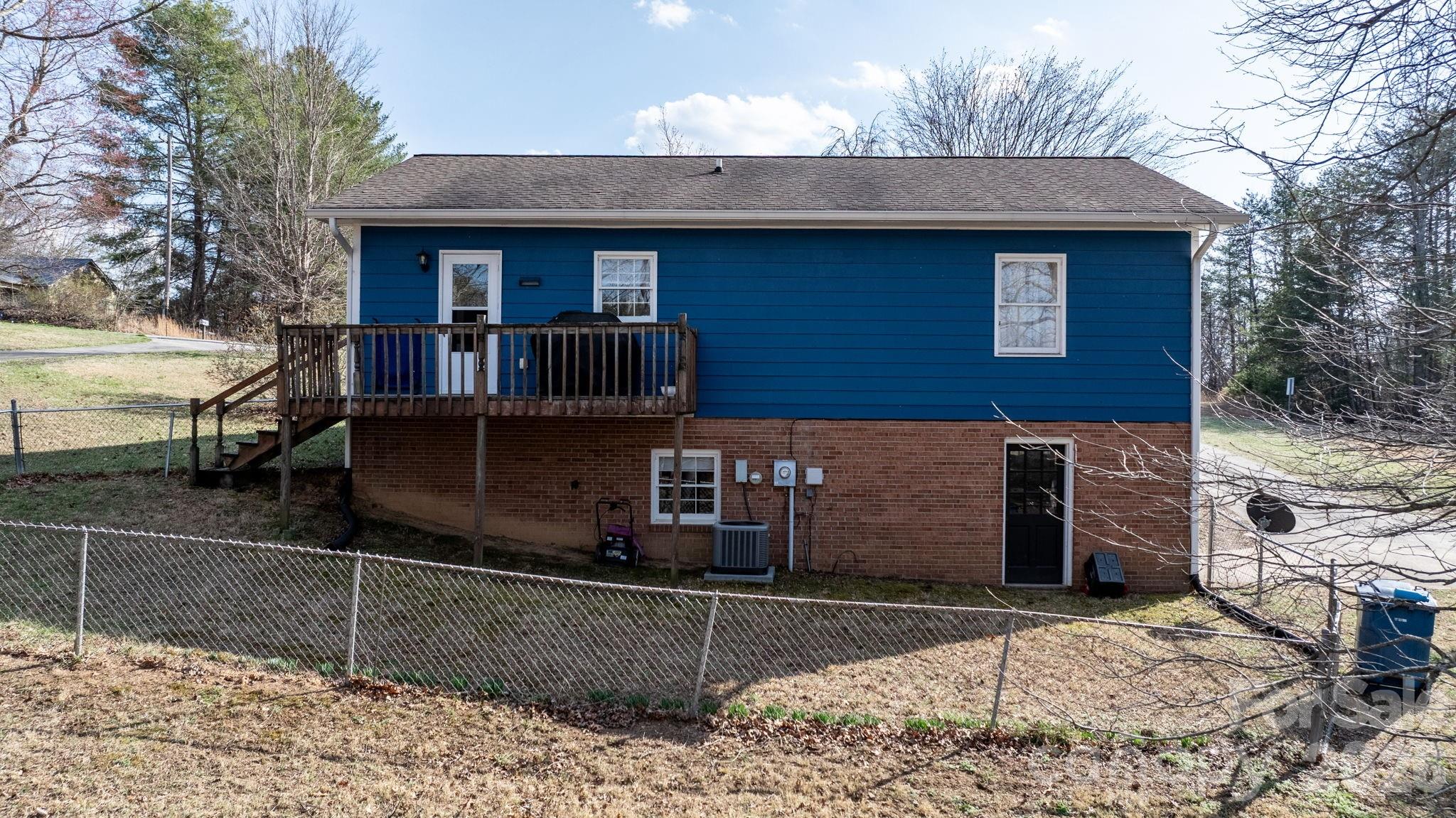 3384 Sheely Road Lenoir, NC 28645 - Photo 27 of 27 a front view of a house with parking