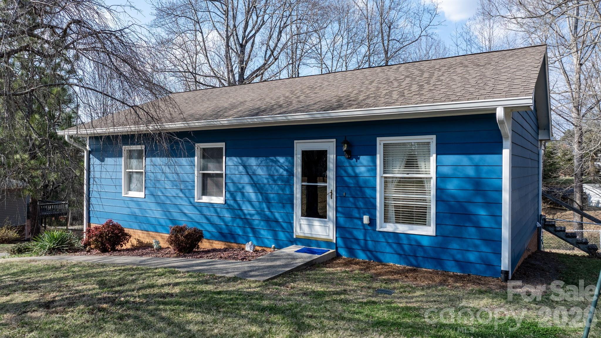3384 Sheely Road Lenoir, NC 28645 - Photo 3 of 27 a view of front of a house with a yard