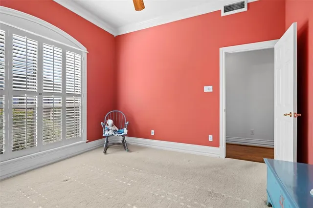 a view of a room with window and air conditioner