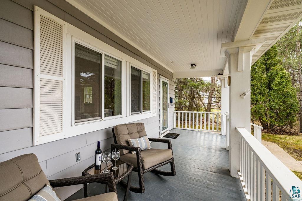 3206 Minnesota Avenue Duluth, MN 55802 - Photo 5 of 51 Covered porch with gray painted wood flooring