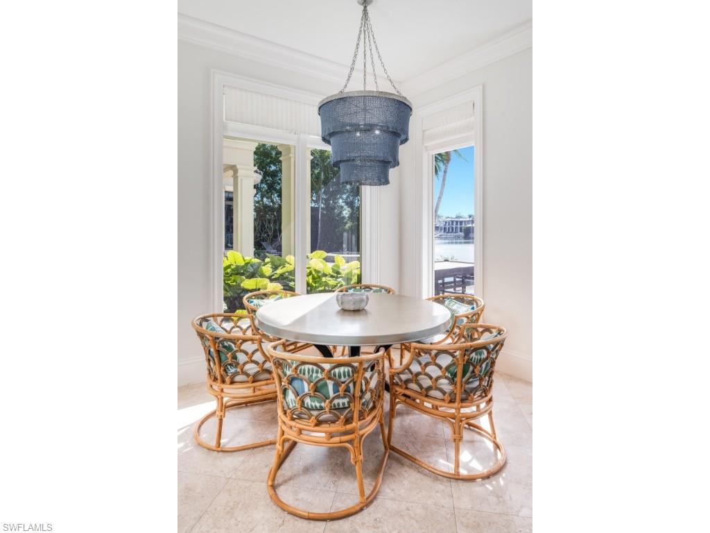 3430 Gin Lane Naples, FL 34102 - Photo 6 of 21 a dining room with furniture and window