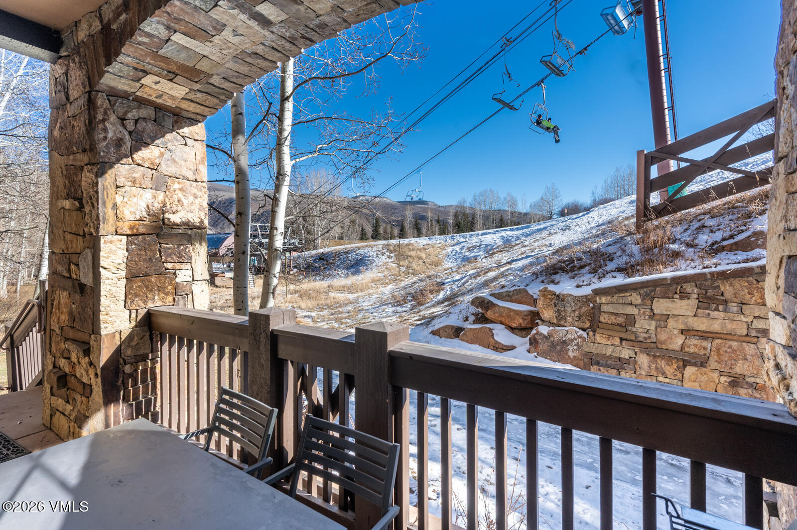 300 Prater Road, Unit B103 Avon, CO 81620 - Photo 16 of 17 a view of a balcony with wooden floor