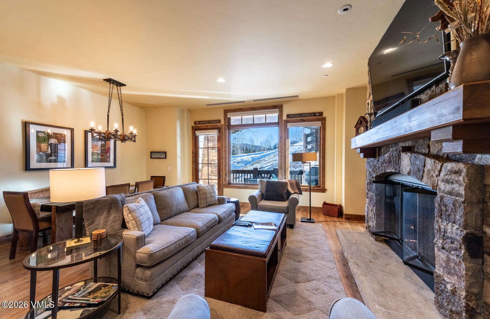 300 Prater Road, Unit B103 Avon, CO 81620 - Photo 2 of 17 a living room with furniture and a flat screen tv