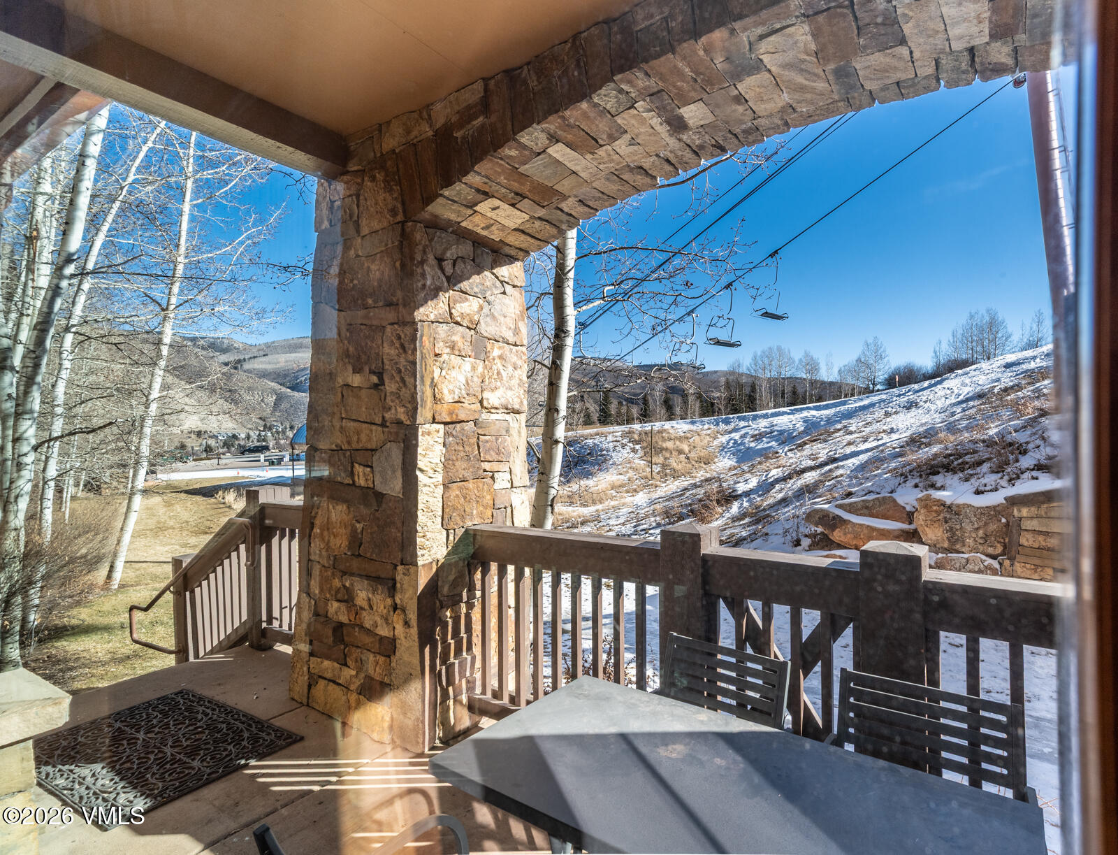 300 Prater Road, Unit B103 Avon, CO 81620 - Photo 6 of 17 a view of a balcony with furniture