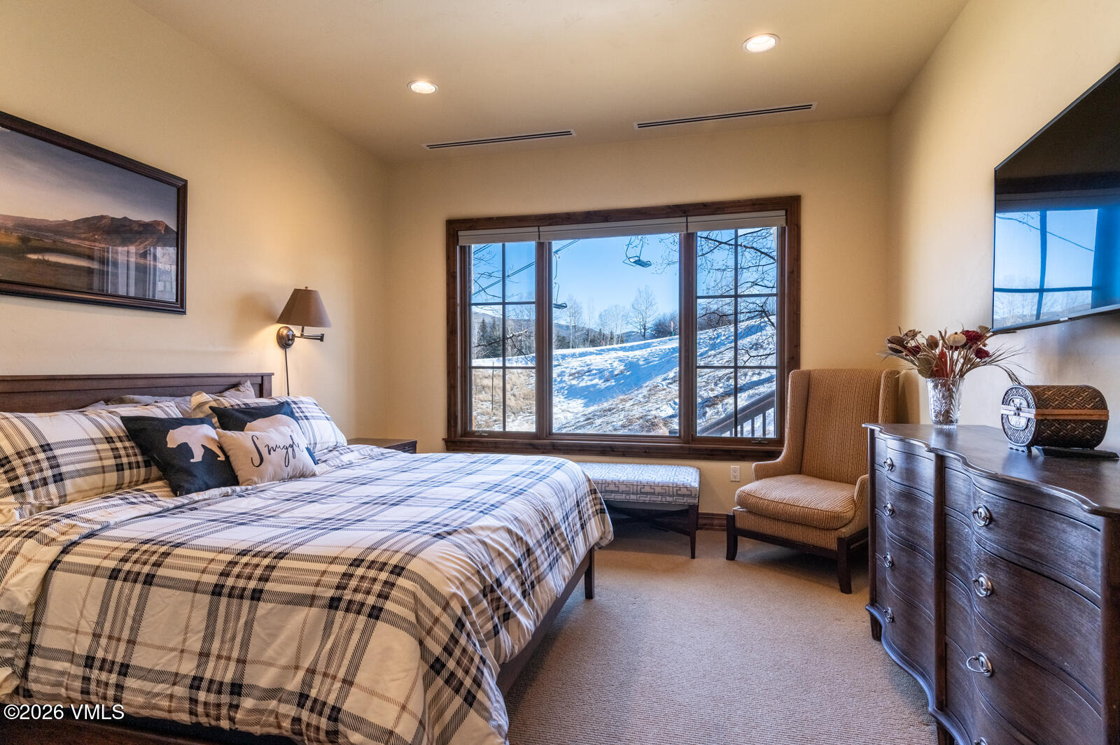 300 Prater Road, Unit B103 Avon, CO 81620 - Photo 9 of 17 a bedroom with bed couch and window